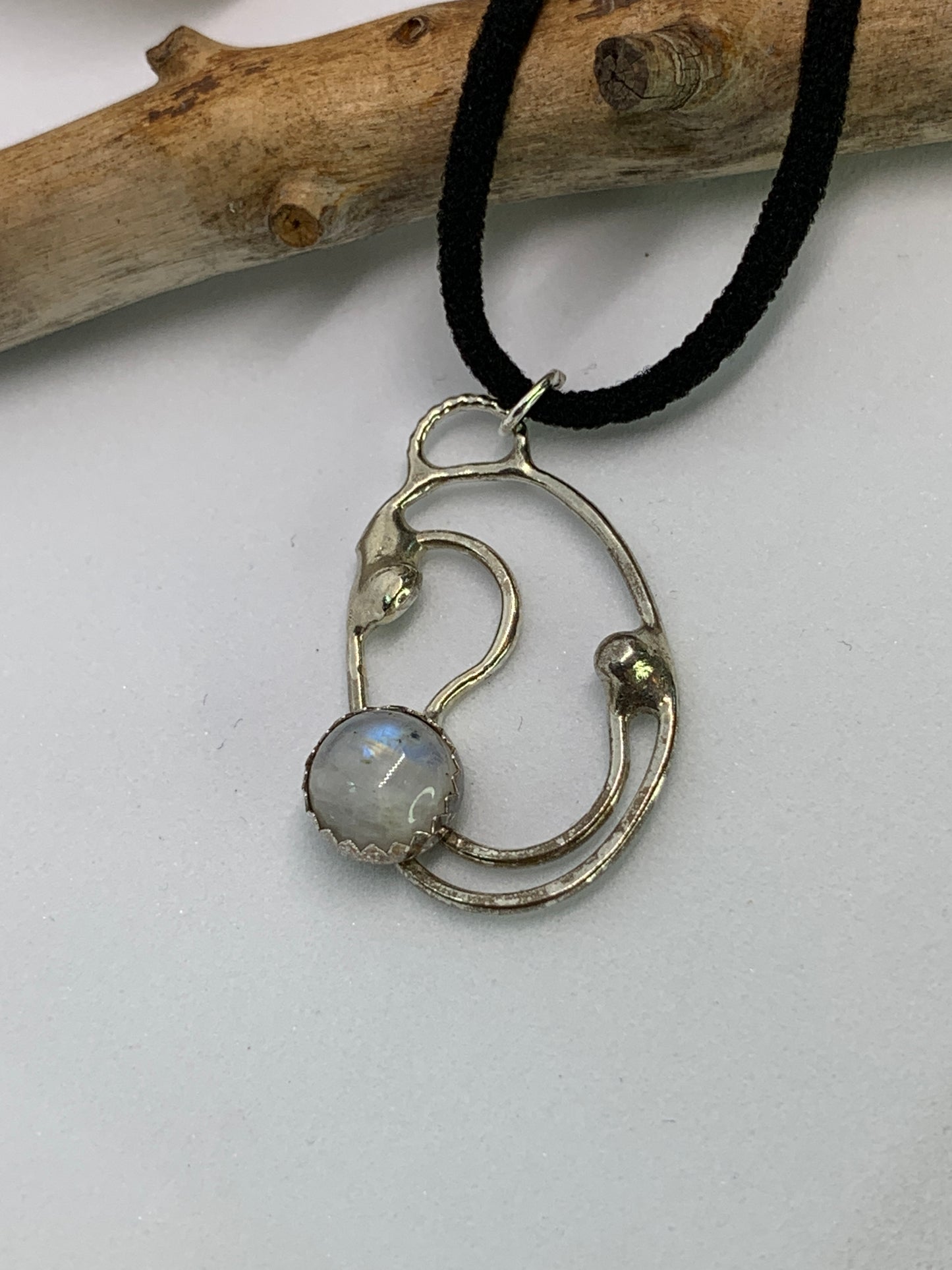 Sterling Silver Moonstone Spiral Circle Pendant. 925 sterling silver with 8mm moonstone set. handmade. Every piece is one of a kind and no two are alike. 