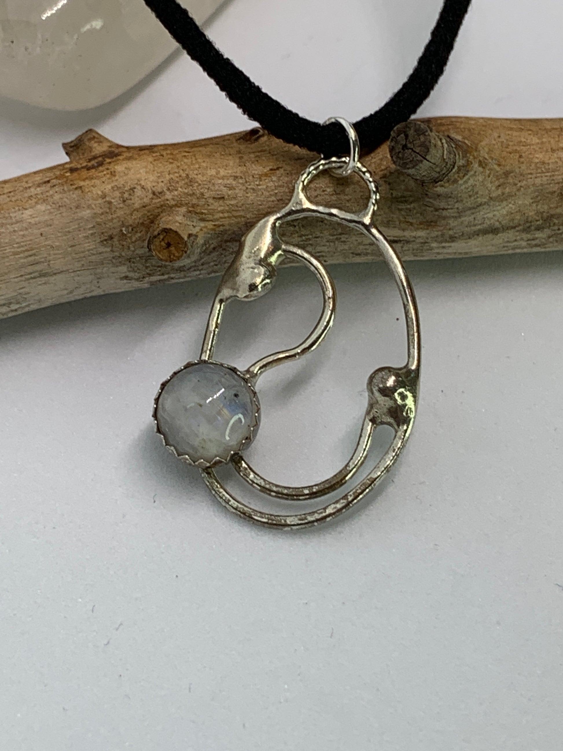 Sterling Silver Moonstone Spiral Circle Pendant. 925 sterling silver with 8mm moonstone set. handmade. Every piece is one of a kind and no two are alike. 